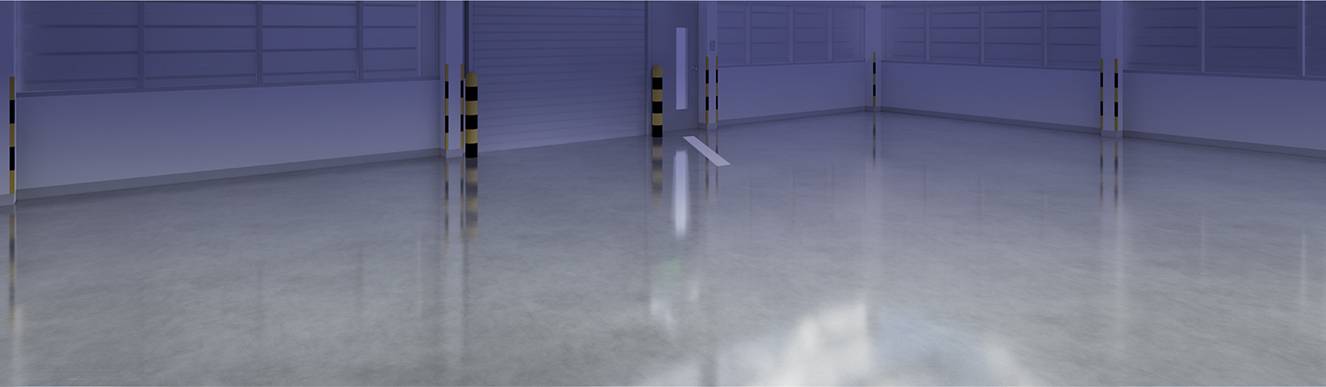 an empty warehouse with a smooth resin floor